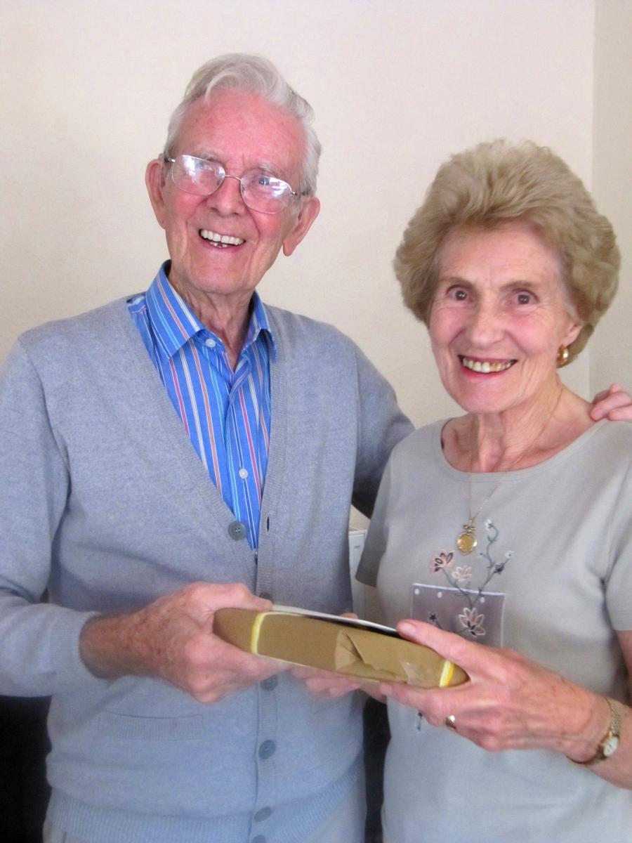 Mervyn receives a long service gift from fellow trustee Mrs Kate Lovell